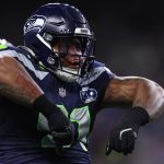 Oct 20, 2025; Seattle, Washington, USA; Seattle Seahawks defensive tackle Byron Murphy II (91) celebrates after a play during the second quarter against the Houston Texans at Lumen Field. Mandatory Credit: Kevin Ng-Imagn Images