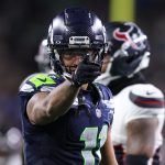 Oct 20, 2025; Seattle, Washington, USA; Seattle Seahawks wide receiver Jaxon Smith-Njigba (11) celebrates after a first down during the third quarter against the Houston Texans at Lumen Field. Mandatory Credit: Kevin Ng-Imagn Images