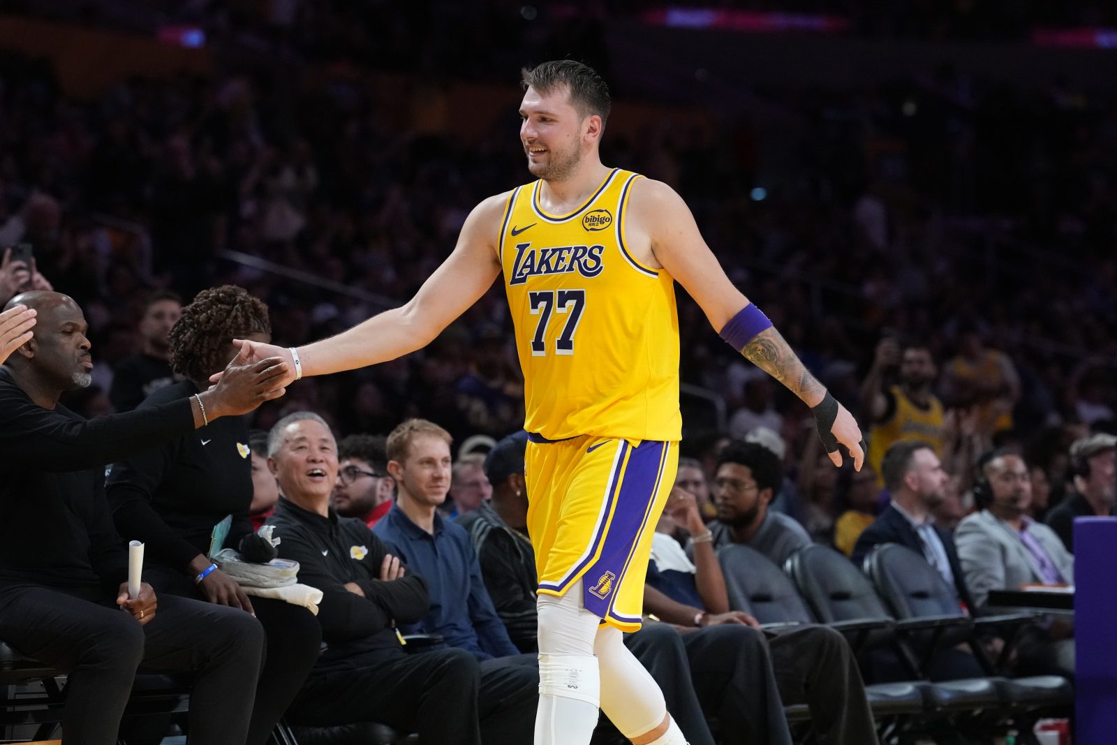 Oct 24, 2025; Los Angeles, California, USA; Los Angeles Lakers guard Luka Doncic (77) returns to the be3nch in the fourth quarteragainst the Minnesota Timberwolves at Crypto.com Arena. Mandatory Credit: Kirby Lee-Imagn Images
