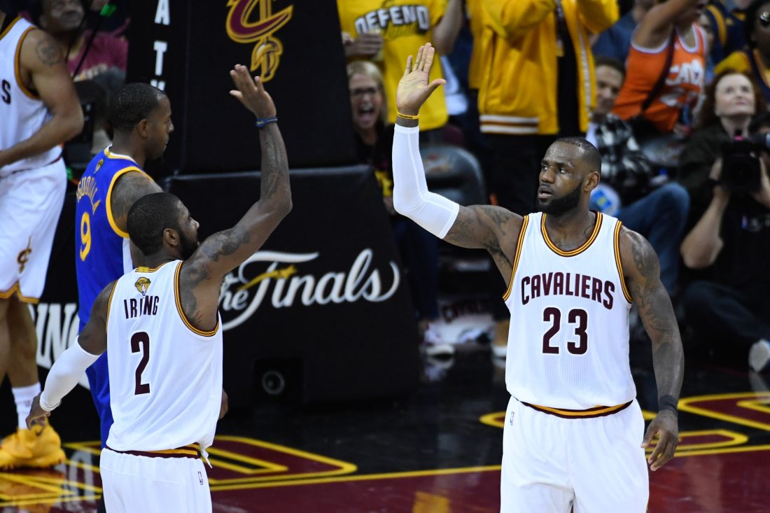 June 7, 2017; Cleveland, OH, USA; Cleveland Cavaliers forward LeBron James (23) celebrates with guard Kyrie Irving (2) during the third quarter in game three of the 2017 NBA Finals against the Golden State Warriors at Quicken Loans Arena. The Warriors defeated the Cavaliers 118-113. Mandatory Credit: Kyle Terada-USA TODAY Sports