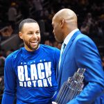 Feb 27, 2022; San Francisco, California, USA; Golden State Warriors guard Stephen Curry (30) receives the All Star MVP trophy from Vince Carter before the game against the Dallas Mavericks at Chase Center. Mandatory Credit: Kelley L Cox-USA TODAY Sports