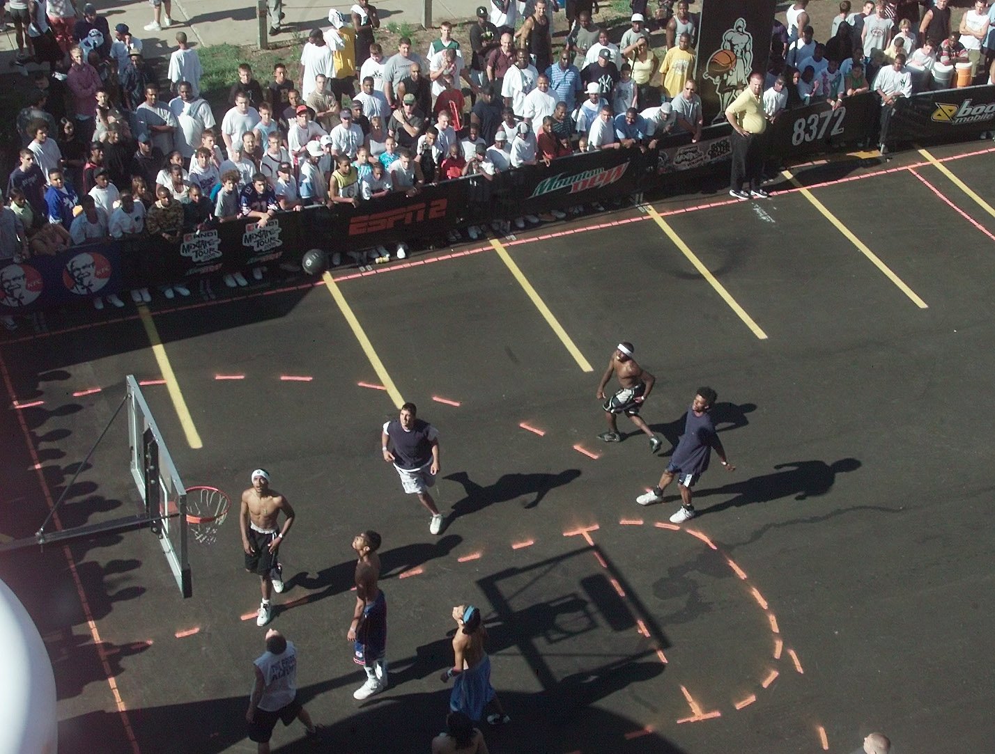 Aug 17, 2005; Rochester, NY, USA; The crowd gathers outside the Blue Cross Arena to watch the selection round of the And1 tour. This view is from an office in the old Casket Company building.