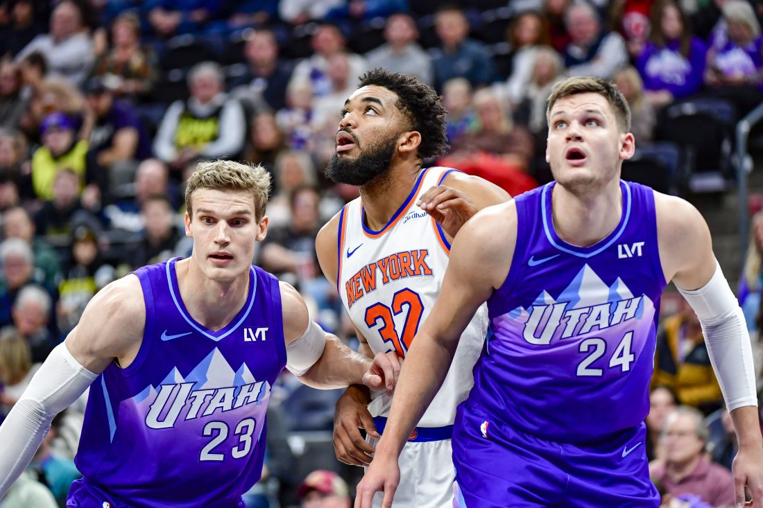 Nov 23, 2024; Salt Lake City, Utah, USA; Utah Jazz forward/center Lauri Markkanen (23) and center Walker Kessler (24) battle for position against New York Knicks center/forward Karl-Anthony Towns (32) during a free-throw during the first half at the Delta Center. Mandatory Credit: Christopher Creveling-Imagn Images