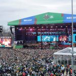 Fans look on as Cam Ward is announced as the first pick during the first day of the NFL Draft presented by Bud Light at the Draft Theater Thursday, April 24, 2025, outside of Lambeau Field in Green Bay, Wisconsin.