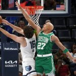 Oct 8, 2025; Memphis, Tennessee, USA; Boston Celtics guard Jordan Walsh (27) defends as Memphis Grizzlies center PJ Hall (16) shoots during the first quarter at FedExForum.