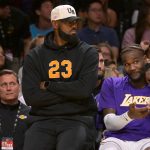 Oct 12, 2025; Los Angeles, California, USA; Los Angeles Lakers forward Lebron James (23) looks on from the bench during the first half against the Golden State Warriors at Crypto.com Arena. Mandatory Credit: Jayne Kamin-Oncea-Imagn Images