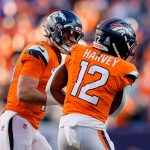 Oct 19, 2025; Denver, Colorado, USA; Denver Broncos quarterback Bo Nix (10) celebrates the touchdown of running back RJ Harvey (12) in the fourth quarter against the New York Giants at Empower Field at Mile High. Mandatory Credit: Isaiah J. Downing-Imagn Images