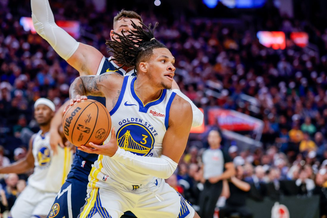 Oct 23, 2025; San Francisco, California, USA; Golden State Warriors guard Will Richard (3) protects the ball against the Denver Nuggets during the fourth quarter at Chase Center.
