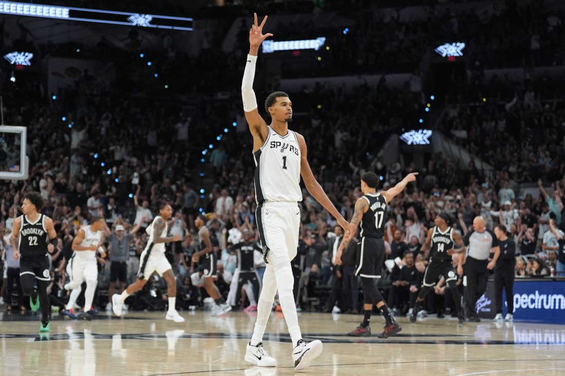 Oct 26, 2025; San Antonio, Texas, USA; San Antonio Spurs forward Victor Wembanyama (1) celebrates in the first half against the Brooklyn Nets at Frost Bank Center.