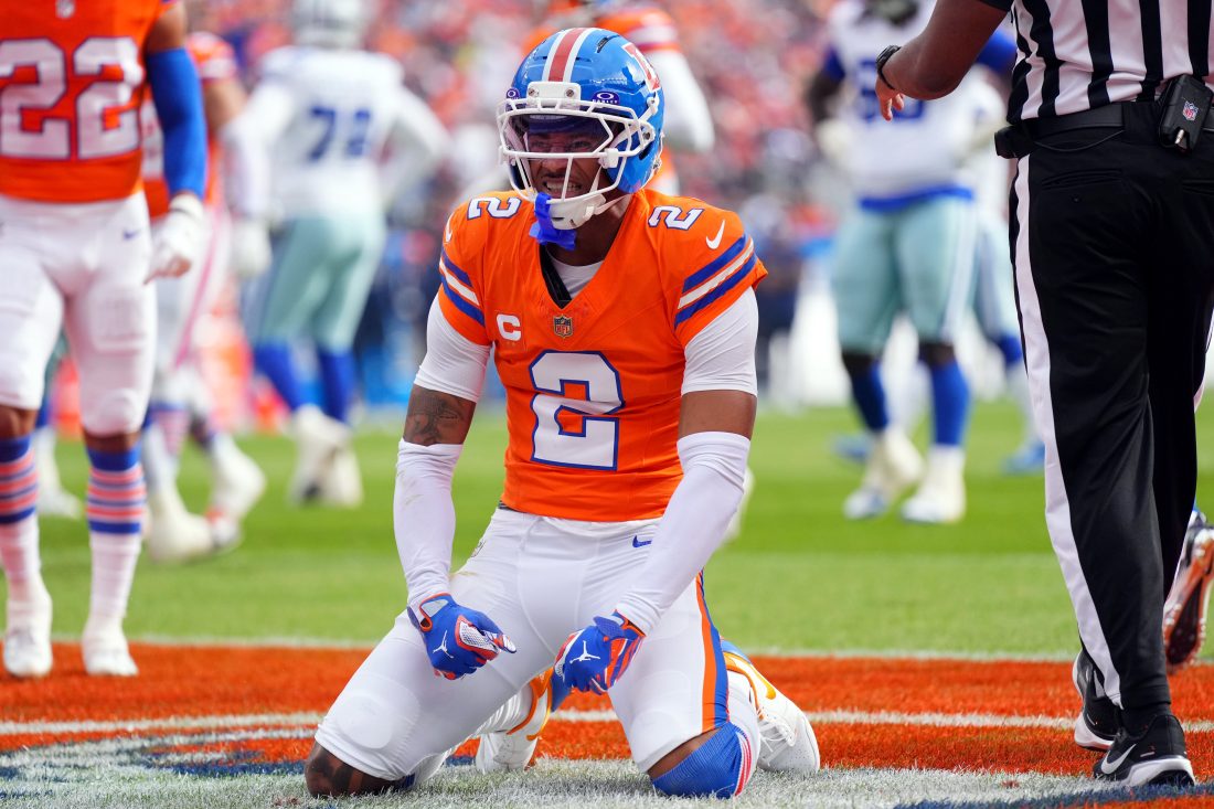 Oct 26, 2025; Denver, Colorado, USA; Denver Broncos cornerback Pat Surtain II (2) reacts in the first quarter against the Dallas Cowboys at Empower Field at Mile High.