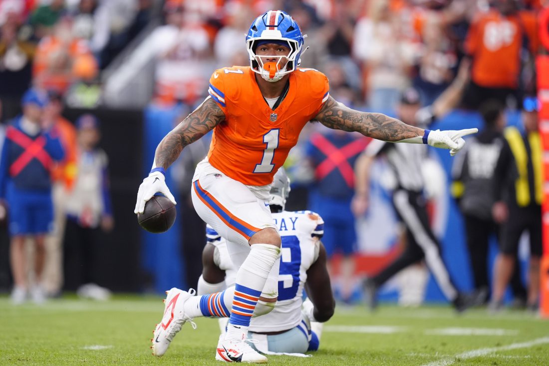 Oct 26, 2025; Denver, Colorado, USA; Denver Broncos tight end Evan Engram (1) runs against the Dallas Cowboys in the second half at Empower Field at Mile High. Mandatory Credit: Ron Chenoy-Imagn Images