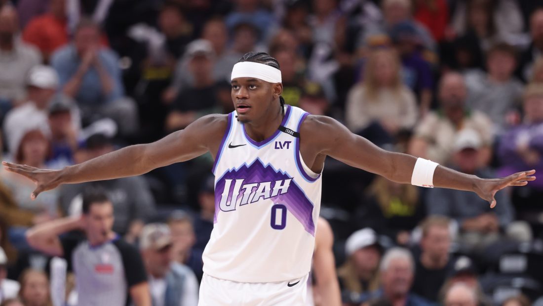 Oct 29, 2025; Salt Lake City, Utah, USA; Utah Jazz forward Taylor Hendricks (0) defends against the Portland Trail Blazers during the second half at Delta Center.