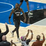 Oct 29, 2025; Minneapolis, Minnesota, USA; Minnesota Timberwolves forward Julius Randle (30) reacts to the fans after making a go ahead shot in the fourth quarter against the Los Angeles Lakers at Target Center.