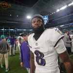 Oct 30, 2025; Miami Gardens, Florida, USA; Baltimore Ravens quarterback Lamar Jackson (8) walks off the field after a win over Miami Dolphins at Hard Rock Stadium. Mandatory Credit: Sam Navarro-Imagn Images