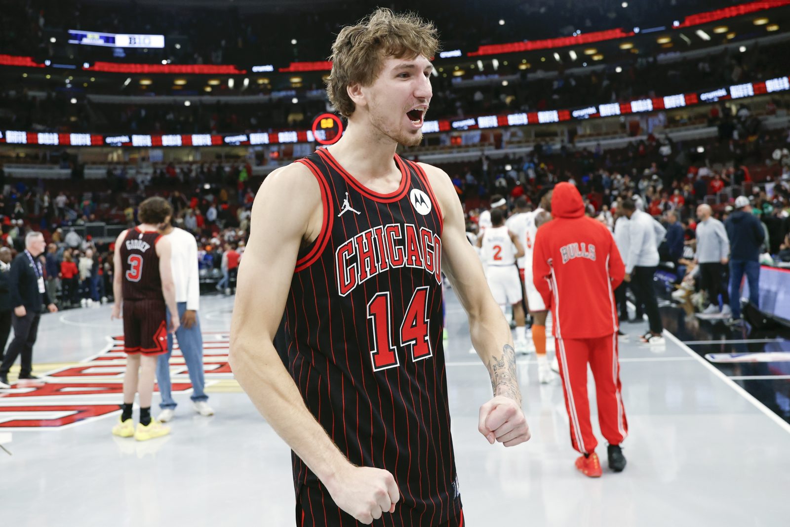 Oct 31, 2025; Chicago, Illinois, USA; Chicago Bulls forward Matas Buzelis (14) celebrates after team's win against the New York Knicks at United Center. Mandatory Credit: Kamil Krzaczynski-Imagn Images