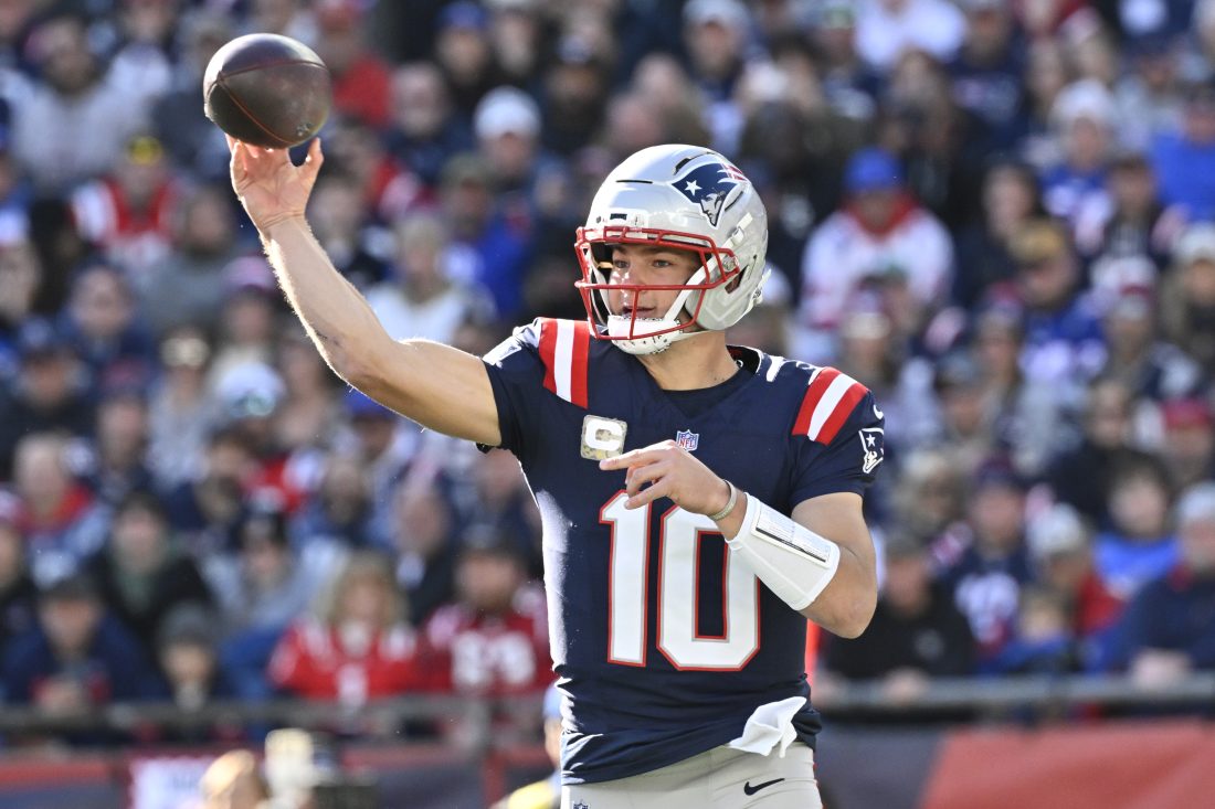 Nov 2, 2025; Foxborough, Massachusetts, USA; New England Patriots quarterback Drake Maye (10) passes against the Atlanta Falcons during the first half at Gillette Stadium. Mandatory Credit: Eric Canha-Imagn Images