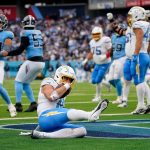 Los Angeles Chargers quarterback Justin Herbert (10) scores a touchdown against the Tennessee Titans during the fourth quarter at Nissan Stadium in Nashville, Tenn., Sunday, Nov. 2, 2025.