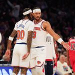 Nov 3, 2025; New York, New York, USA; New York Knicks guard Jordan Clarkson (00) celebrates with New York Knicks guard Josh Hart (3) after scoring a three pointer during the second half against the Washington Wizards at Madison Square Garden. Mandatory Credit: Lucas Boland-Imagn Images
