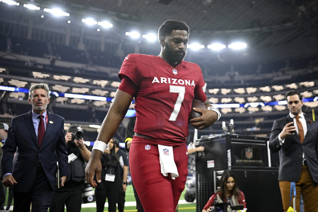 Nov 3, 2025; Arlington, Texas, USA; Arizona Cardinals quarterback Jacoby Brissett (7) leaves the field after defeating the Dallas Cowboys at AT&T Stadium.