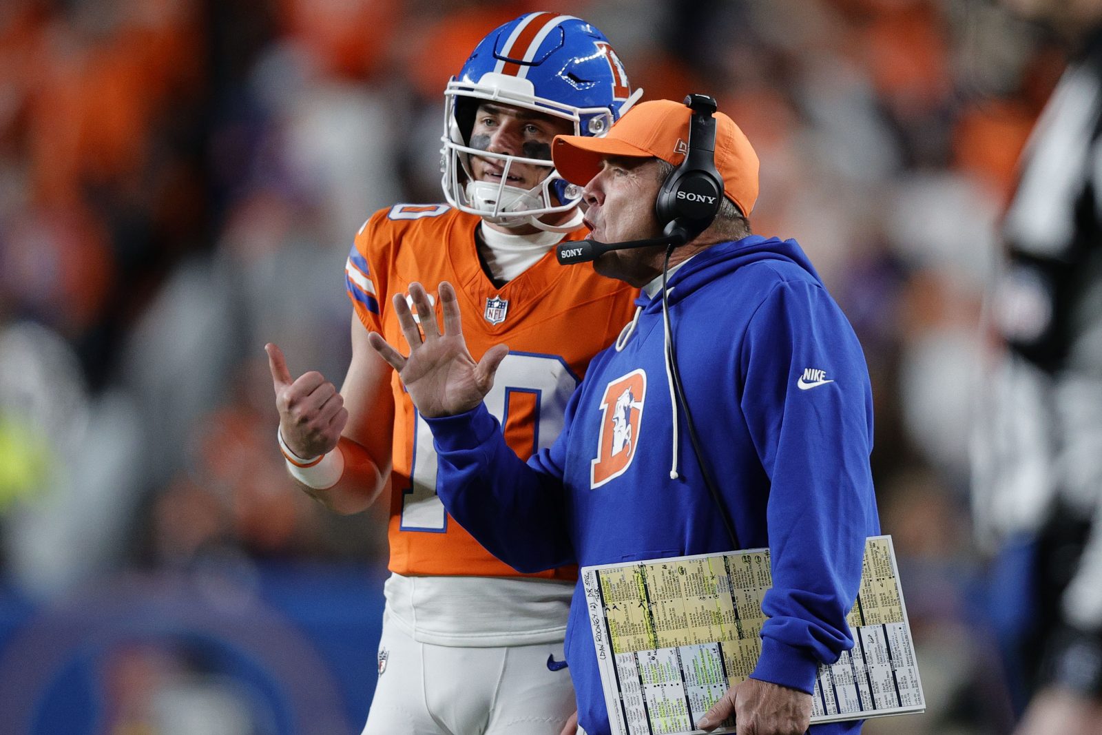 Nov 6, 2025; Denver, Colorado, USA; Denver Broncos head coach Sean Payton talks with quarterback Bo Nix (10) during the second half at Empower Field at Mile High. Mandatory Credit: Isaiah J. Downing-Imagn Images