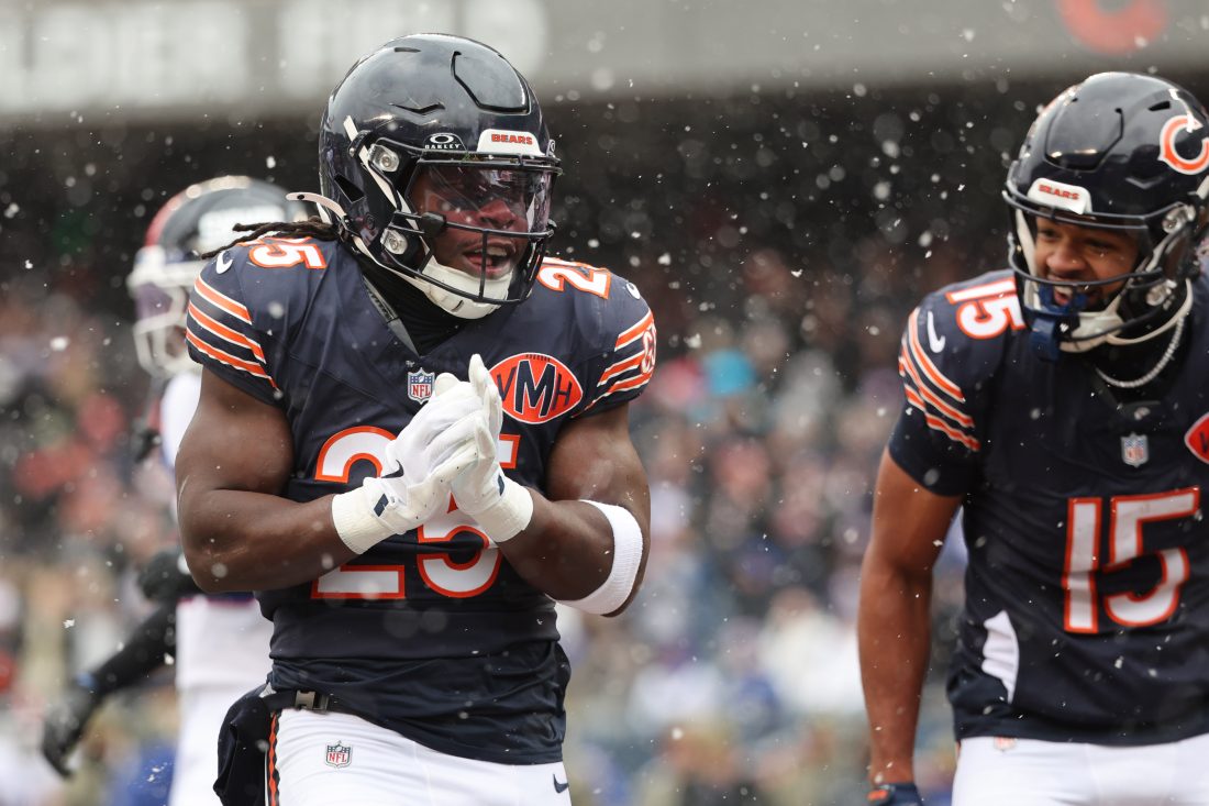 Nov 9, 2025; Chicago, Illinois, USA; Chicago Bears running back Kyle Monangai (25) reacts after rushing for a touchdown against the New York Giants during the first half at Soldier Field. Mandatory Credit: Mike Dinovo-Imagn Images