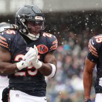 Nov 9, 2025; Chicago, Illinois, USA; Chicago Bears running back Kyle Monangai (25) reacts after rushing for a touchdown against the New York Giants during the first half at Soldier Field. Mandatory Credit: Mike Dinovo-Imagn Images