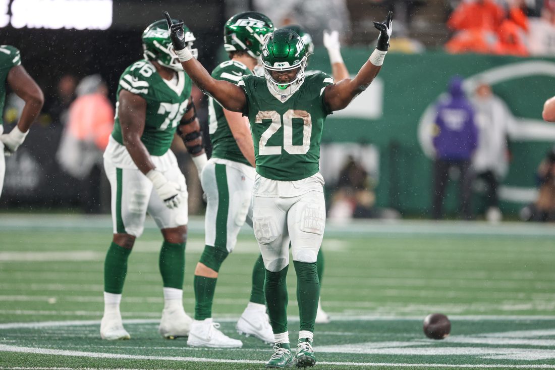 Nov 9, 2025; East Rutherford, New Jersey, USA; New York Jets running back Breece Hall (20) celebrates during the fourth quarter against the Cleveland Browns at MetLife Stadium. Mandatory Credit: Vincent Carchietta-Imagn Images