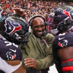 Nov 9, 2025; Houston, Texas, USA; Houston Texans head coach DeMeco Ryans with defensive tackle Sheldon Rankins (90) and linebacker Azeez Al-Shaair (0) following a game against the Jacksonville Jaguars at NRG Stadium. Mandatory Credit: Thomas Shea-Imagn Images