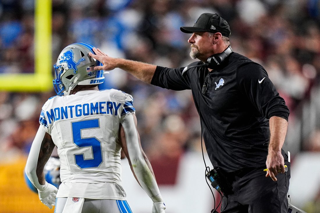 Detroit Lions head coach Dan Campbell celebrates a two point conversion against Washington Commanders scored by running back David Montgomery (5) during the first half at Northwest Stadium in Landover, Md. on Sunday, November 9, 2025.
