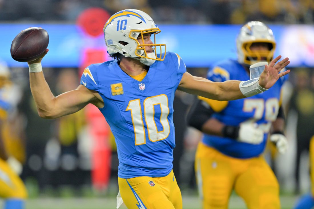 Nov 9, 2025; Inglewood, California, USA; Los Angeles Chargers quarterback Justin Herbert (10) passes the ball against the Pittsburgh Steelers during the fourth quarter of the game at SoFi Stadium.