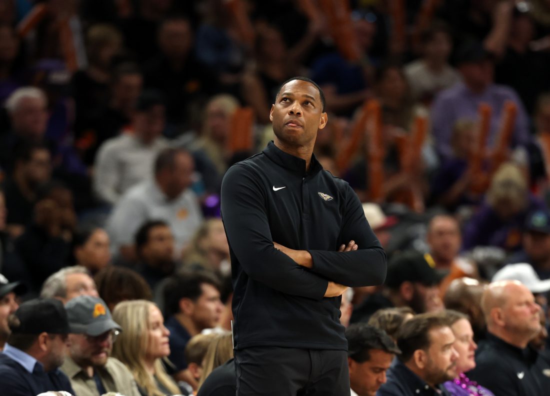 Nov 10, 2025; Phoenix, Arizona, USA; New Orleans Pelicans head coach Willie Green reacts against the Phoenix Suns in the second half at the Mortgage Matchup Center. Mandatory Credit: Mark J. Rebilas-Imagn Images