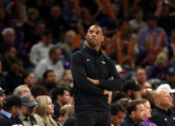 Nov 10, 2025; Phoenix, Arizona, USA; New Orleans Pelicans head coach Willie Green reacts against the Phoenix Suns in the second half at the Mortgage Matchup Center. Mandatory Credit: Mark J. Rebilas-Imagn Images