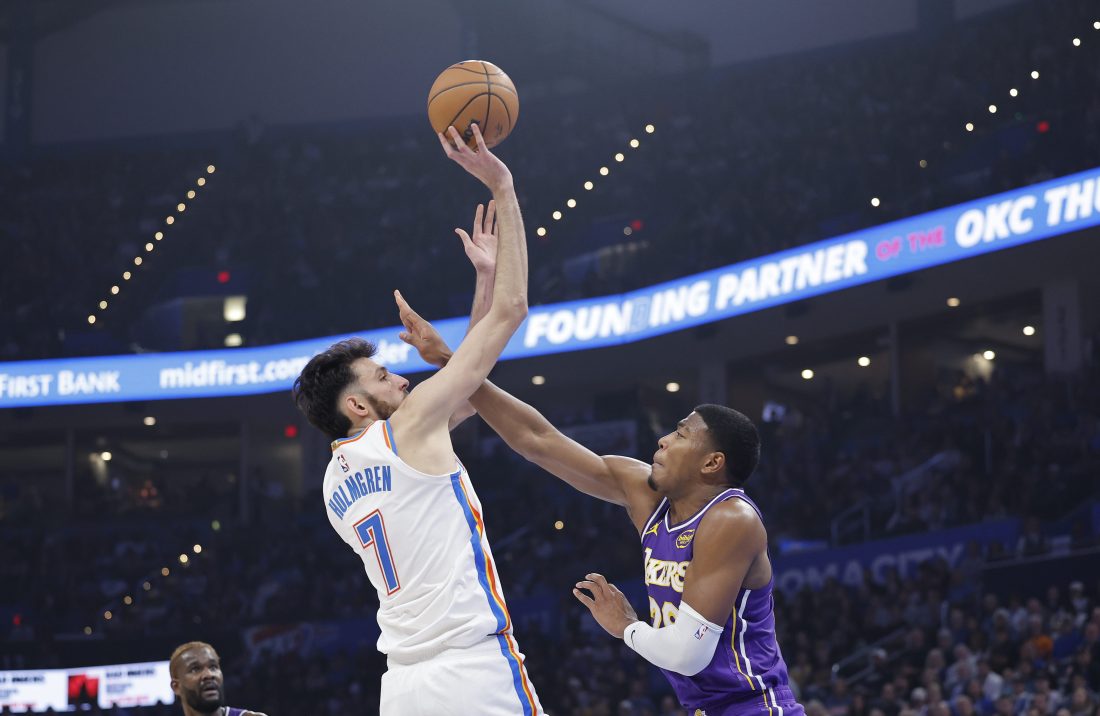 Nov 12, 2025; Oklahoma City, Oklahoma, USA; Oklahoma City Thunder center Chet Holmgren (7) shoots over Los Angeles Lakers forward Rui Hachimura (28) during the second quarter at Paycom Center. Mandatory Credit: Alonzo Adams-Imagn Images
