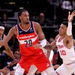 Nov 12, 2025; Houston, Texas, USA; Washington Wizards center Alex Sarr (20) handles the ball against Houston Rockets forward Jabari Smith Jr. (10) during the game at Toyota Center. Mandatory Credit: Erik Williams-Imagn Images