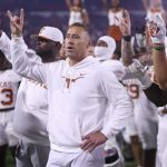 Nov 15, 2025; Athens, Georgia, USA; Texas Longhorns head coach Steve Sarkisian and team gesture after the game against the Georgia Bulldogs at Sanford Stadium. Mandatory Credit: Brett Davis-Imagn Images