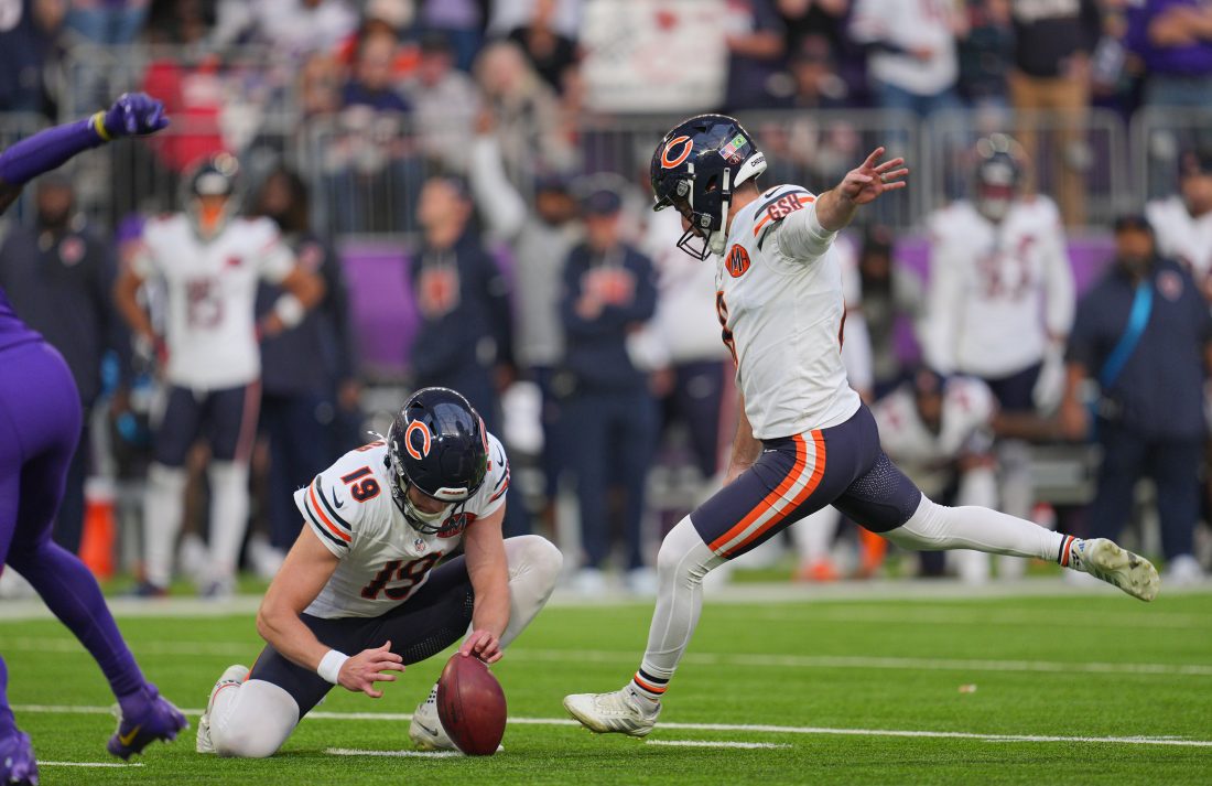 Nov 16, 2025; Minneapolis, Minnesota, USA; Chicago Bears kicker Cairo Santos (8) kicks a game-winning field goal against the Minnesota Vikings during the fourth quarter at U.S. Bank Stadium.