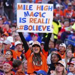 Nov 16, 2025; Denver, Colorado, USA; A Denver Broncos fan holds a sign during the first quarter of the game against the Kansas City Chiefs at Empower Field at Mile High. Mandatory Credit: Ron Chenoy-Imagn Images