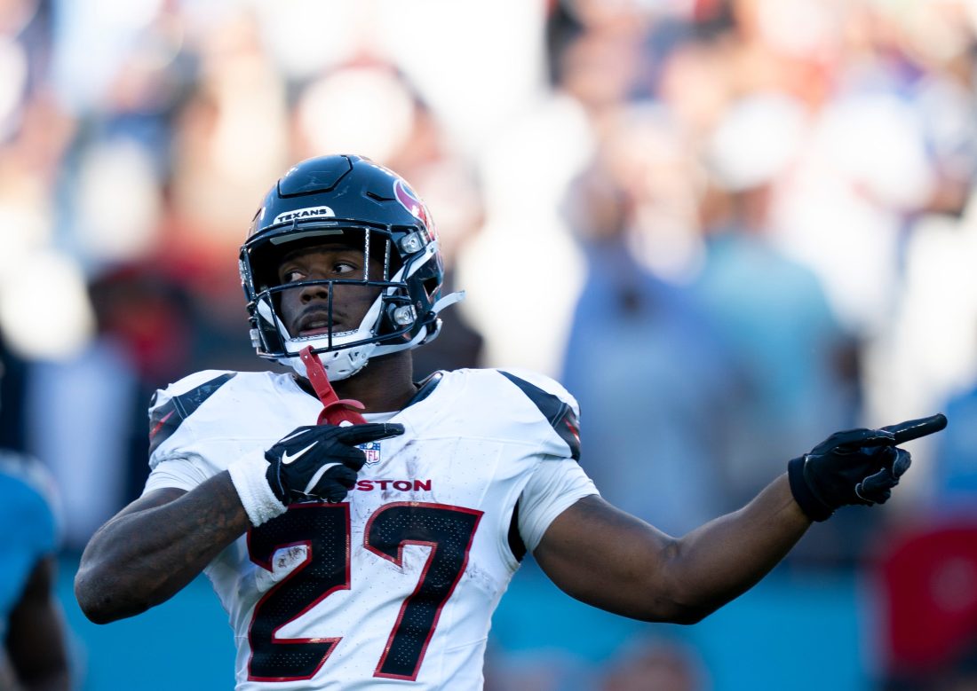 Houston running back Woody Marks (27) signals a first down to allow the Texans to run out the clock and kick a game-winning field goal to beat the Tennessee Titans 16-13 during their game at Nissan Stadium in Nashville, Tenn., Sunday, Nov. 16, 2025