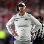 Nov 15, 2025; Oxford, Mississippi, USA; Mississippi Rebels head coach Lane Kiffin looks on during a time out during the first quarter against the Florida Gators at Vaught-Hemingway Stadium. Mandatory Credit: Petre Thomas-Imagn Images