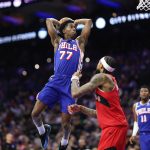 Nov 19, 2025; Philadelphia, Pennsylvania, USA; Philadelphia 76ers guard VJ Edgecombe (77) drives for a dunk in front of Toronto Raptors forward Brandon Ingram (3) during the second quarter at Xfinity Mobile Arena.