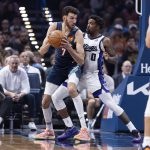 Nov 19, 2025; Oklahoma City, Oklahoma, USA; Oklahoma City Thunder center Chet Holmgren (7) moves the ball towards the basket against Sacramento Kings guard Malik Monk (0) during the second quarter at Paycom Center. Mandatory Credit: Alonzo Adams-Imagn Images