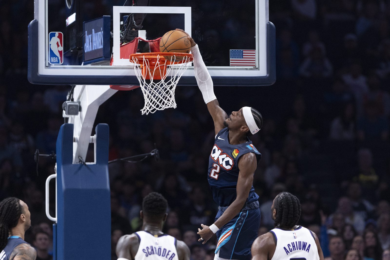 Nov 19, 2025; Oklahoma City, Oklahoma, USA; Oklahoma City Thunder guard Shai Gilgeous-Alexander (2) dunks against the Sacramento Kings during the second quarter at Paycom Center.