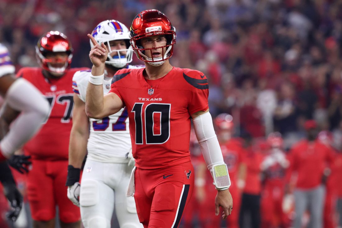 Nov 20, 2025; Houston, Texas, USA; Houston Texans quarterback Davis Mills (10) celebrates after a touchdown against the Buffalo Bills in the second quarter at NRG Stadium.