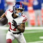 Nov 23, 2025; Detroit, Michigan, USA; New York Giants wide receiver Wan'Dale Robinson (17) runs upfield after catching a swing pass in the second quarter against the Detroit Lions at Ford Field.