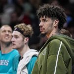 Nov 23, 2025; Atlanta, Georgia, USA; Charlotte Hornets injured guard LaMelo Ball (1) shown on the bench against the Atlanta Hawks during the second half at State Farm Arena. Mandatory Credit: Dale Zanine-Imagn Images