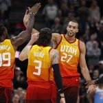 Mar 17, 2018; Salt Lake City, UT, USA; Utah Jazz center Rudy Gobert (27) reacts with teammates forward Jae Crowder (99), guard Ricky Rubio (3) and guard Donovan Mitchell (45) in the fourth quarter against the Sacramento Kingsat Vivint Smart Home Arena.