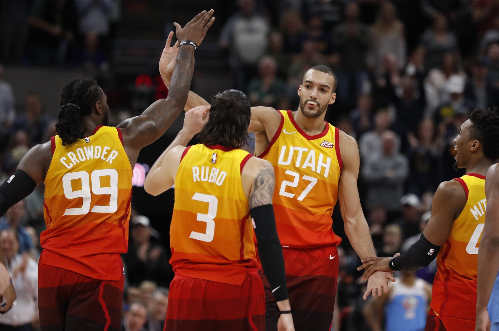 Mar 17, 2018; Salt Lake City, UT, USA; Utah Jazz center Rudy Gobert (27) reacts with teammates forward Jae Crowder (99), guard Ricky Rubio (3) and guard Donovan Mitchell (45) in the fourth quarter against the Sacramento Kingsat Vivint Smart Home Arena.