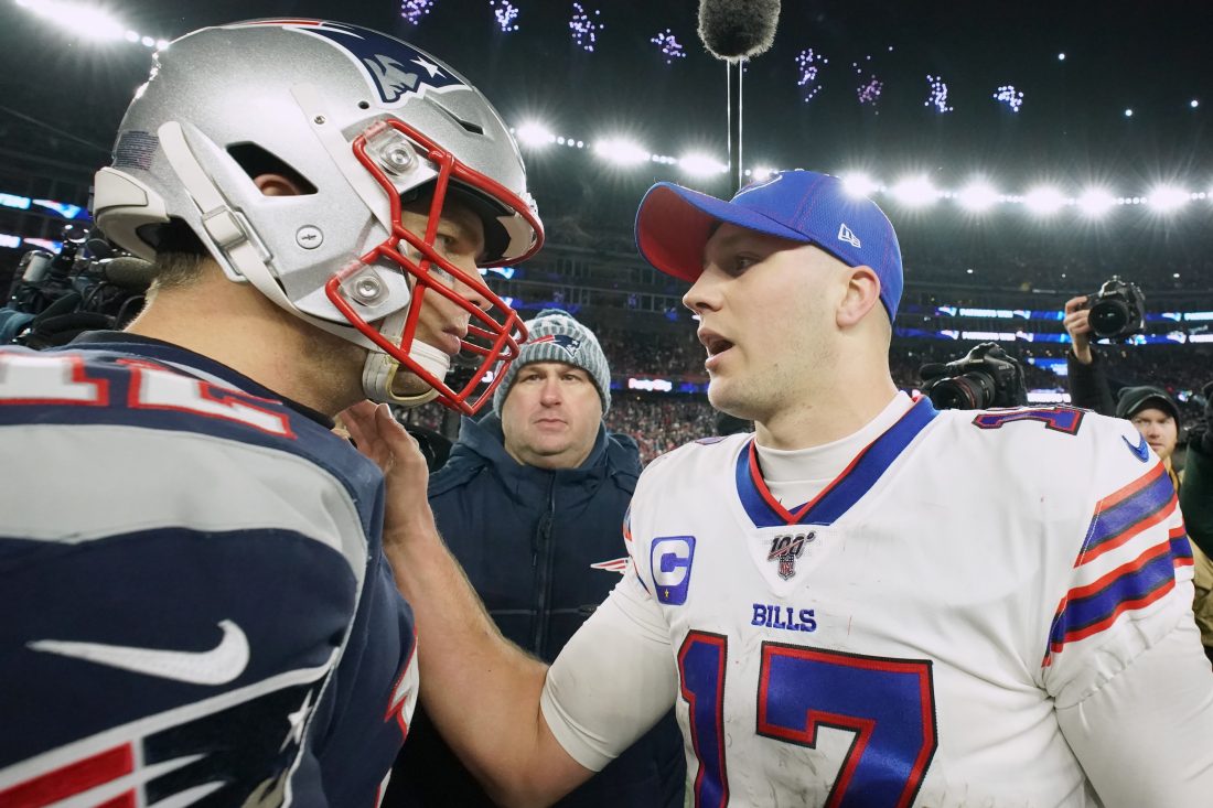 Dec 21, 2019; Foxborough, Massachusetts, USA; New England Patriots quarterback Tom Brady (12) meets Buffalo Bills quarterback Josh Allen (17) after the game at Gillette Stadium. The Patriots defeated Buffalo 24-17. Mandatory Credit: David Butler II-USA TODAY Sports