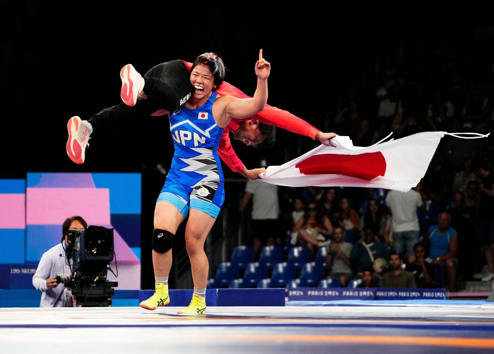 Kagami Yuka of Japan celebrates after winning the women's wrestling freestyle 76kg gold against USA's Kennedy Blades during the Paris 2024 Olympic Summer Games on Aug. 11, 2024.