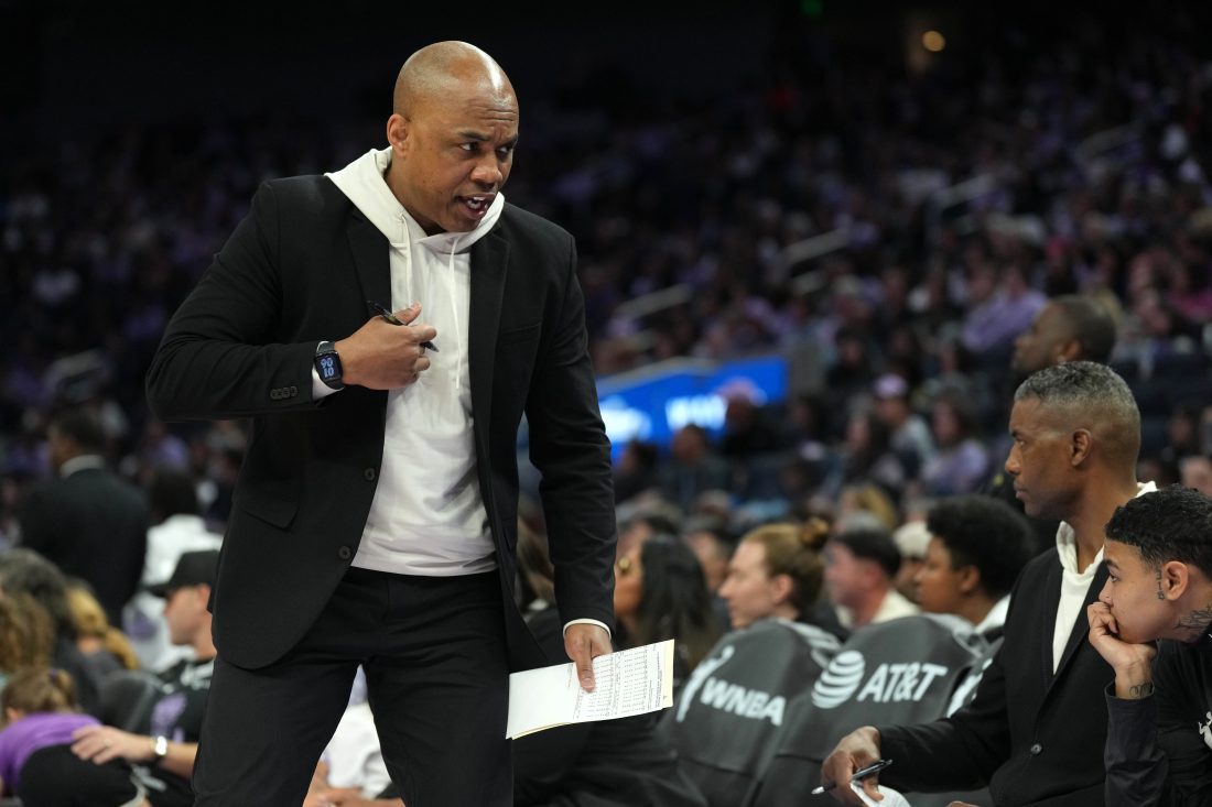 Jun 7, 2025; San Francisco, California, USA; Las Vegas Aces assistant coach Ty Ellis talks on the sideline during the second quarter against the Golden State Valkyries at Chase Center. Mandatory Credit: Darren Yamashita-Imagn Images